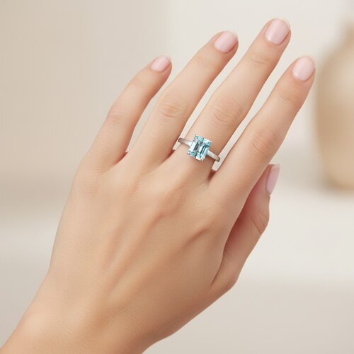 Anillo solitario Circón Baguette Agua Marina